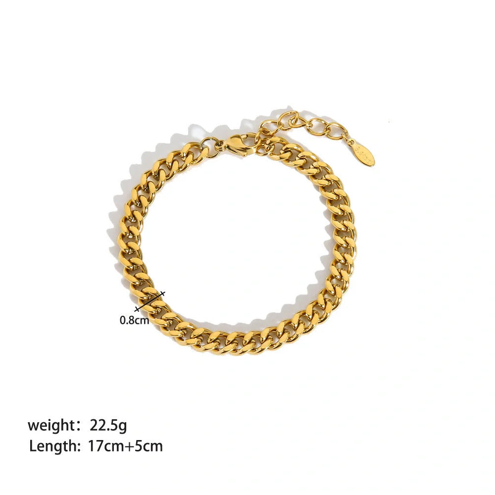Elegant stainless steel bracelet with a sleek geometric design, gold-plated finish, and unisex style suitable for any occasion.