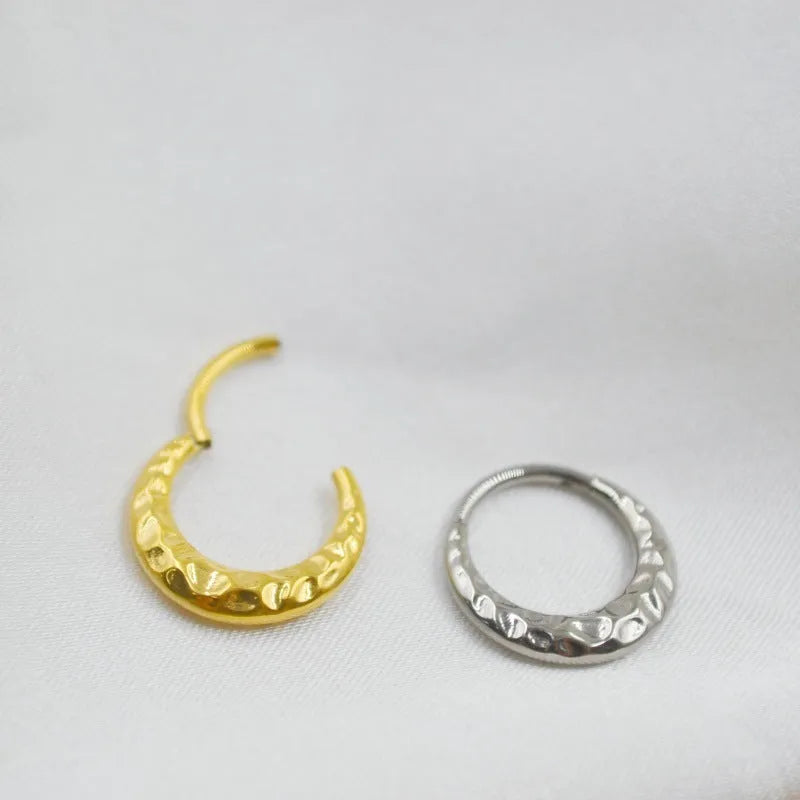 Titanium alloy concave-convex nose ring in gold or silver colour with carved design texture