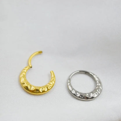 Titanium alloy concave-convex nose ring in gold or silver colour with carved design texture