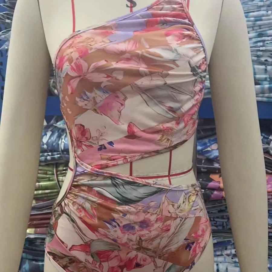 Rose gold patterned women's swimsuit on a white background
