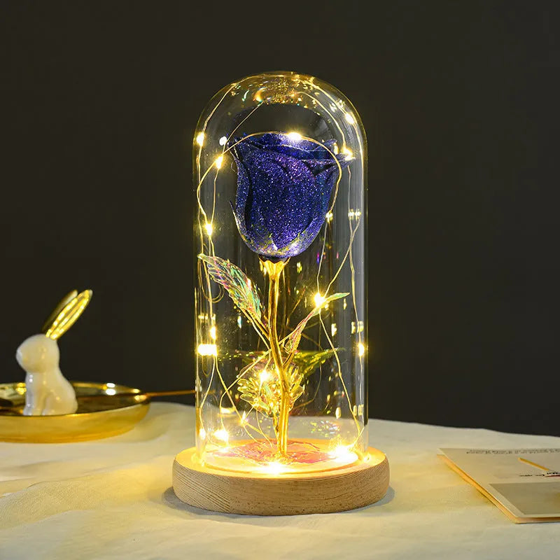 Eternal rose in glass dome with LED string lights, colour options include red, gold, grey, rose red, blue, pink