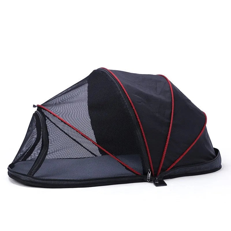 Black and blue half mesh portable folding tent for cats on a grey background.
