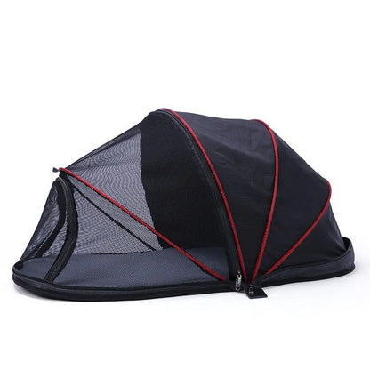 Black and blue half mesh portable folding tent for cats on a grey background.