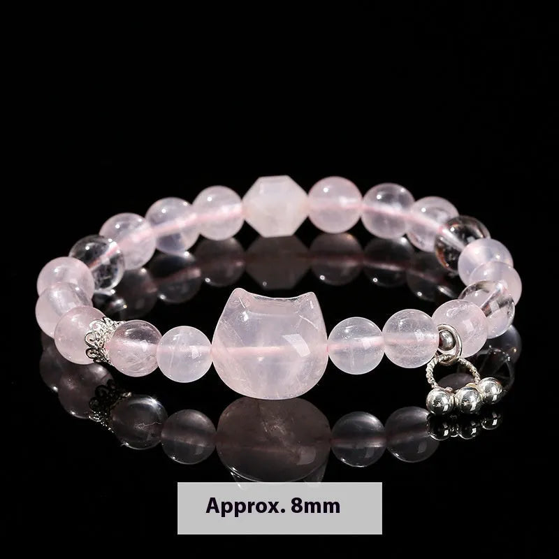Women's geometric cat head bracelet with pink crystal beads and copper setting
