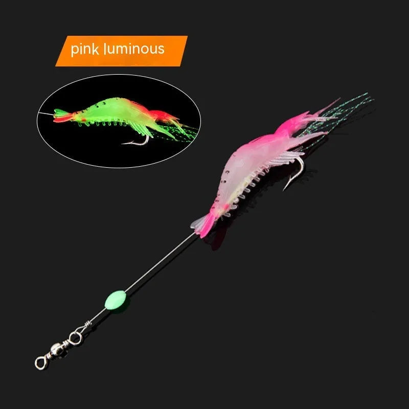 Six soft plastic fishing lures with hooks in various colours including luminous patterns