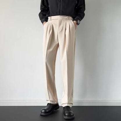 Men's straight-fit loose trousers in apricot colour on a hanger, showing the full length and classic cut.