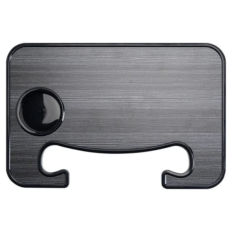 Foldable black car laptop and dining tray with cup holder on a steering wheel