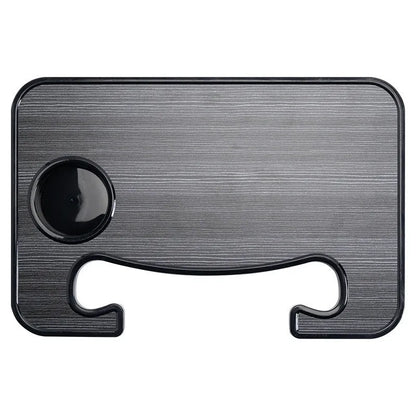 Foldable black car laptop and dining tray with cup holder on a steering wheel