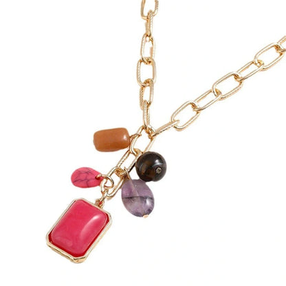 Elegant pendant necklace with a modern geometric design in vibrant colours, perfect for the discerning British woman.