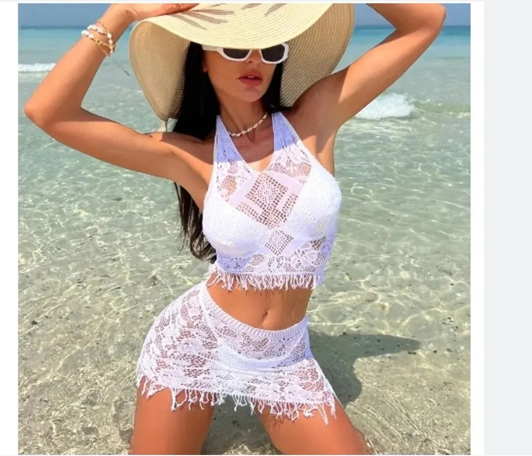 Women's white bikini set with tassel skirt cover-up and lace trim