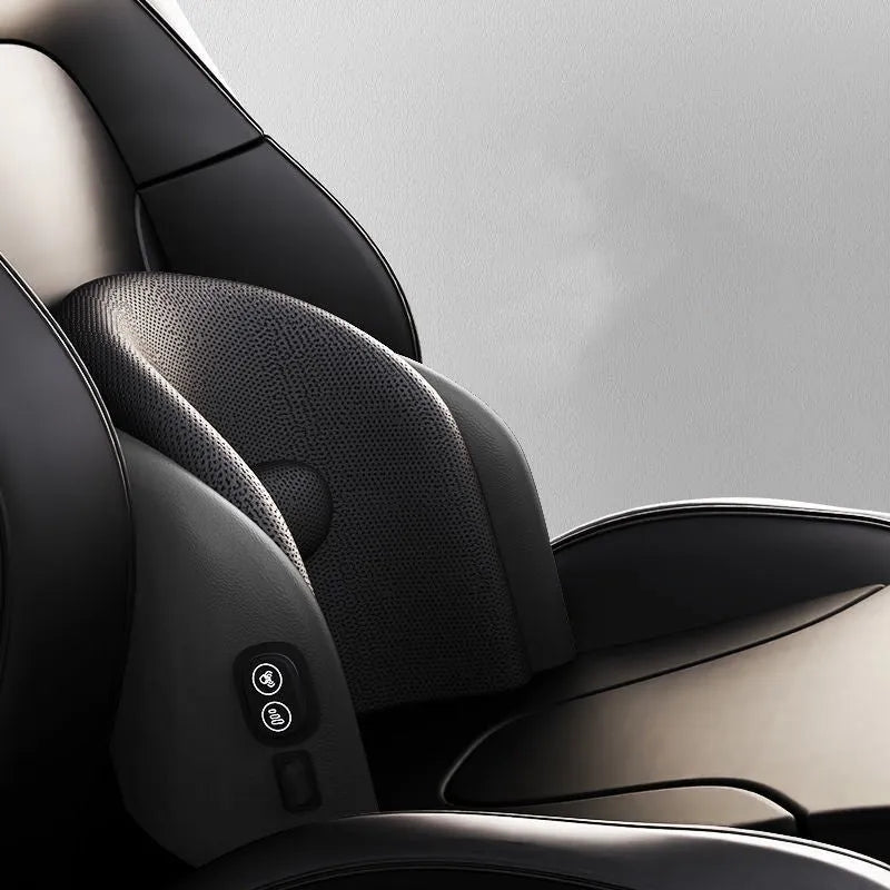 Black car massage cushion with headrest and lumbar support on a car seat, showing wired controller.