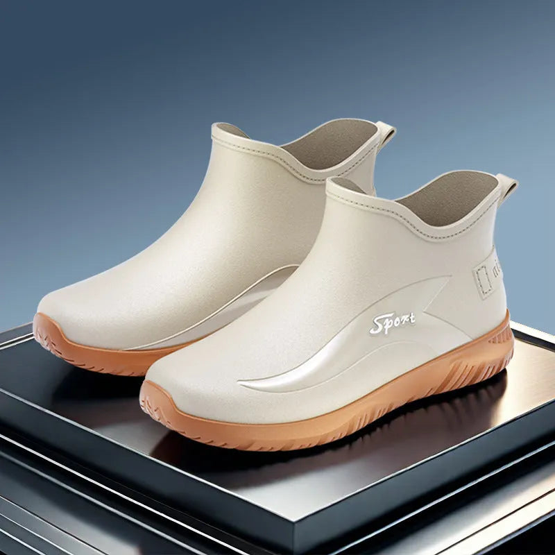 Men's short PVC rubber boots in beige, black, and black-red colours with a non-slip flat sole.