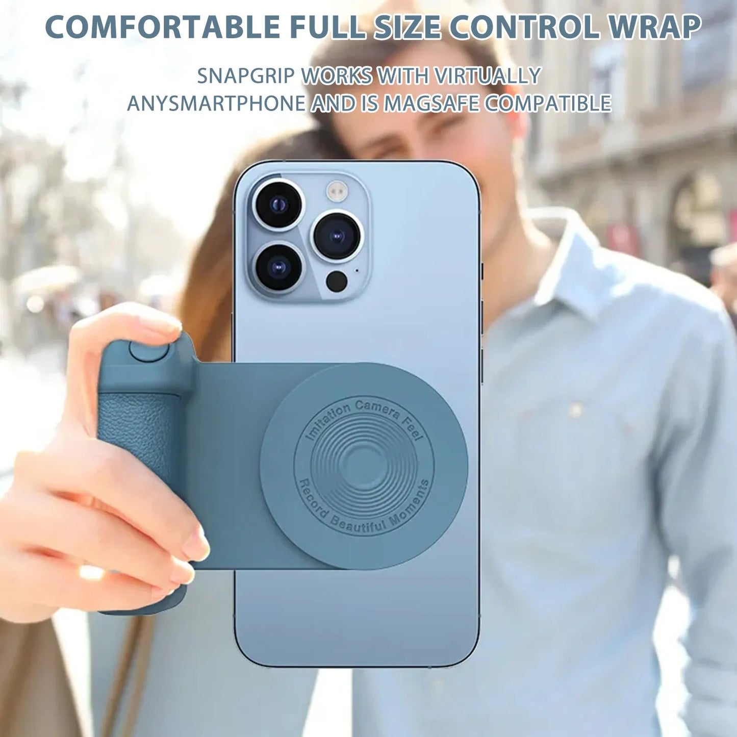 Black magnetic phone camera grip with rotatable bracket and ergonomic PU leather handle on a table.