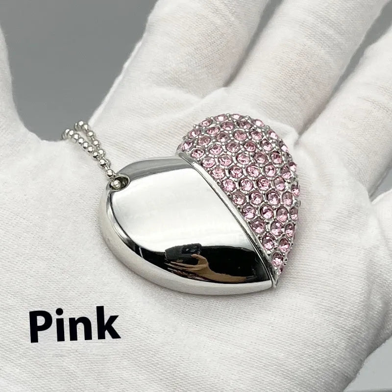 Blue heart-shaped USB flash drive with a brick-inlaid pattern on its metal surface.