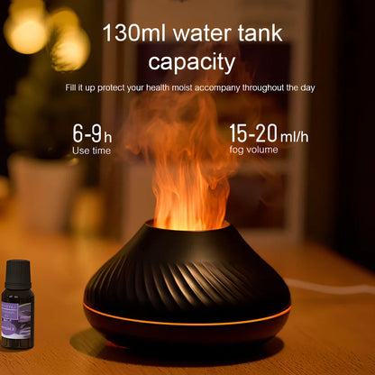 Black RGB flame aroma diffuser 130ml showing 3D colourful volcano mist effect on table
