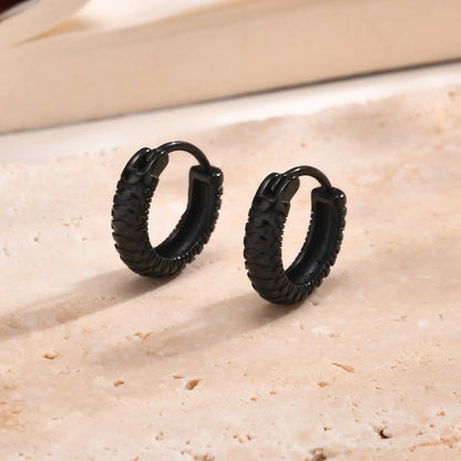Stainless steel snake pattern earrings in black or gold finish showing textured design