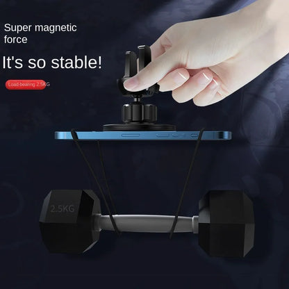 Black aluminium alloy magnetic phone holder attached to a car air vent, showing adjustable ball joint.