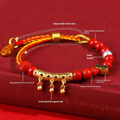 Women's hand-woven cinnabar bracelet with bell design in emperor red sand colour on red rope cord
