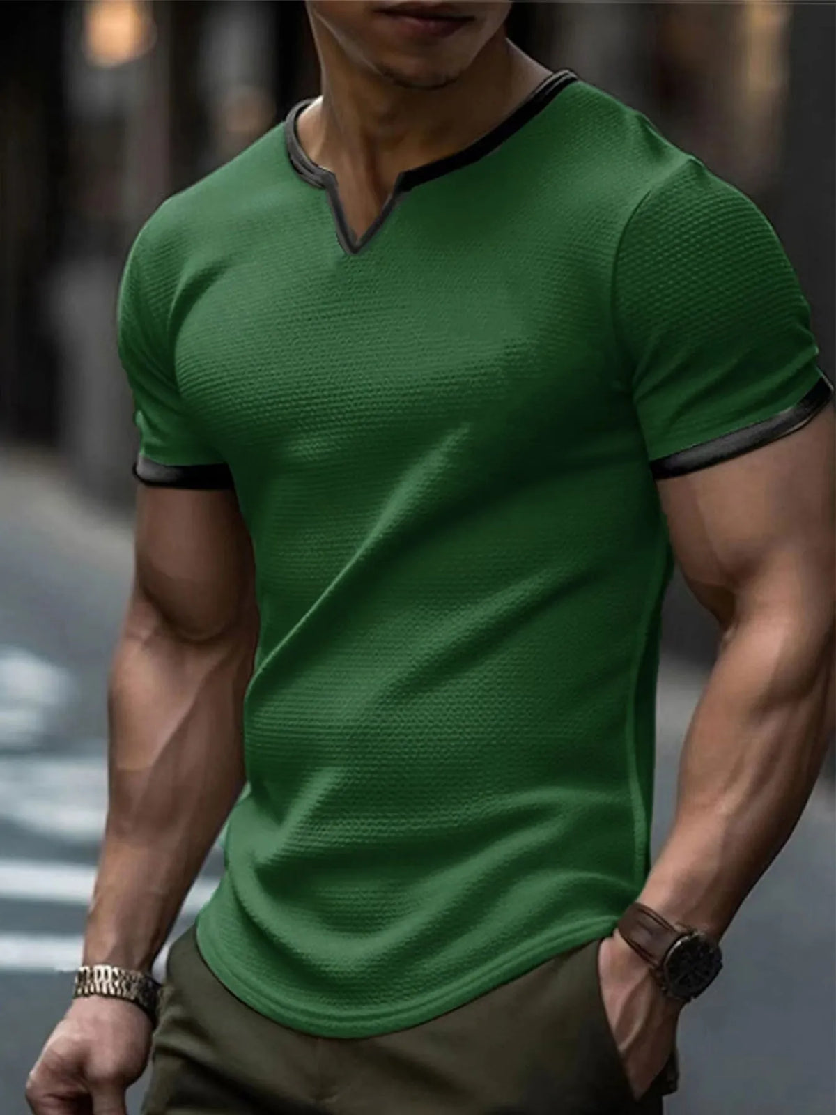 V-neck colour-block waffle texture outdoor sports T-shirt in polyester fabric on a neutral background.