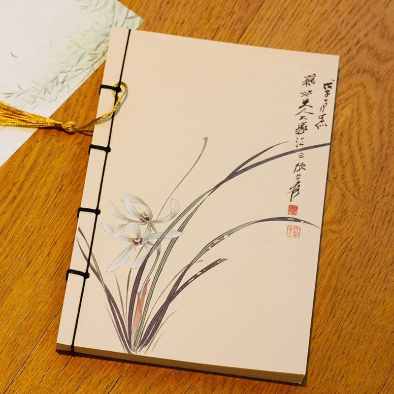 A5 antique wire-bound notebook with classical artwork cover, black oil wax rope binding, and decorative tassels