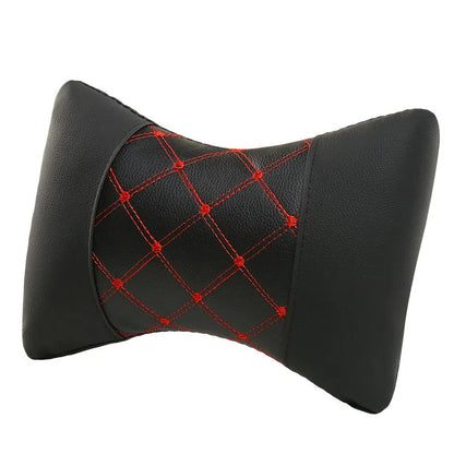 Black leather quilted car headrest with diamond pattern and red stitching lines on cervical support pillow