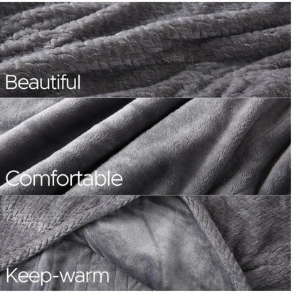 Light grey cotton electric blanket showing adjustable controls, displayed in a home setting.