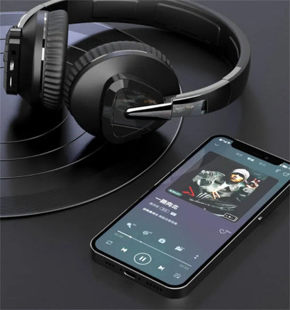 H3 wireless over-ear headset in black showing AUX port and on-ear controls.