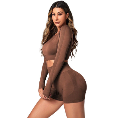 Women's high waist yoga suit in black colour showing long sleeve top and matching leggings