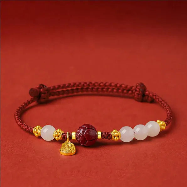 Women's Hetian jade and cinnabar red rope bracelet with adjustable 925 silver chain