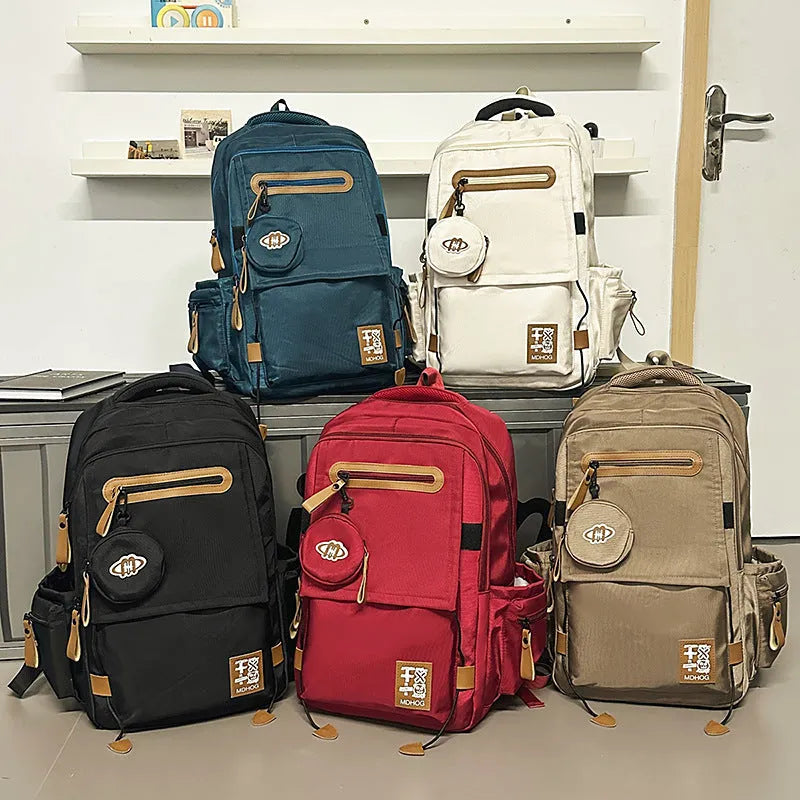 Large capacity waterproof nylon leisure travel backpack with contrast stitching in multiple colour options