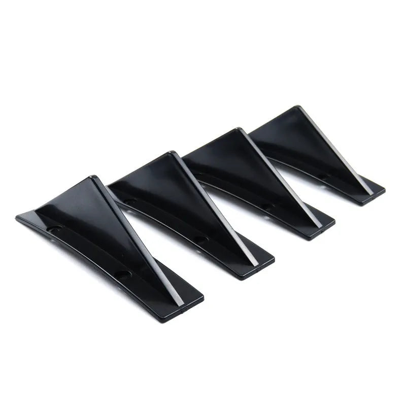 Black triangular car rear spoiler made of ABS plastic, 15cm wide, with mounting screws and adhesive.