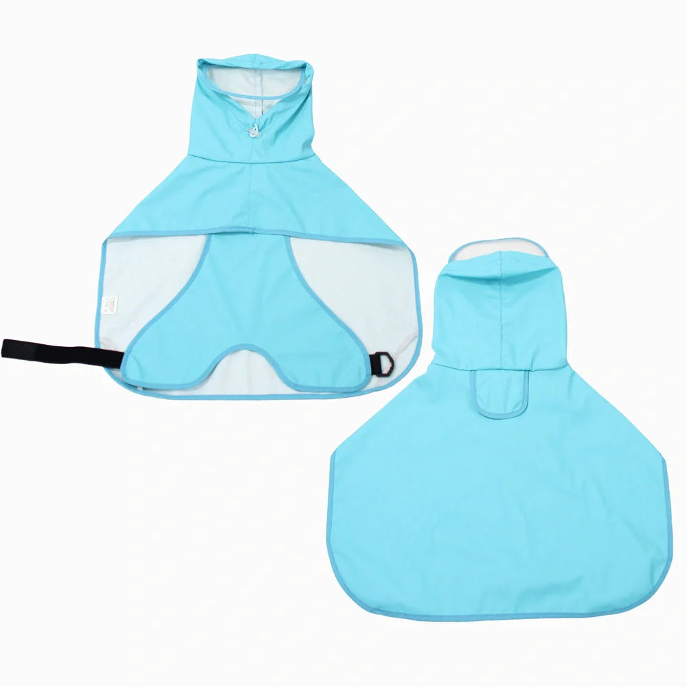 Dog wearing a yellow waterproof raincoat with a transparent brim and bellyband