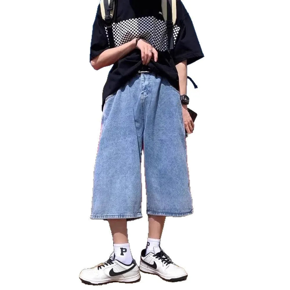 Men's blue washed denim shorts with high waist and cropped straight-leg design on a neutral background