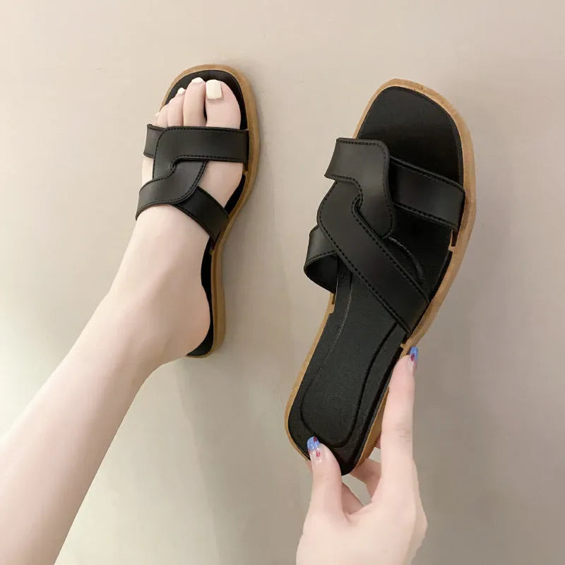 Women's PVC toe ring slippers with solid colour cross straps and non-slip sole