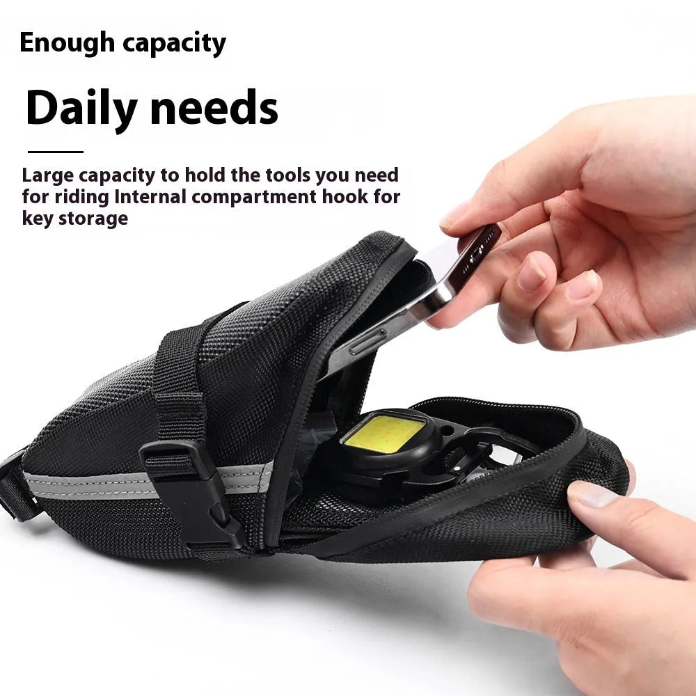 Black cycling saddle bag with quick-release mount showing 20x8x6cm dimensions on bicycle