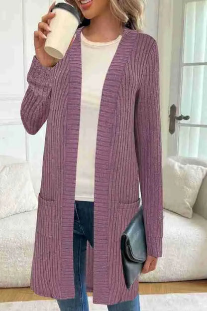 Long sleeve loose fit knitted cardigan jacket with side pockets, shown in grey.