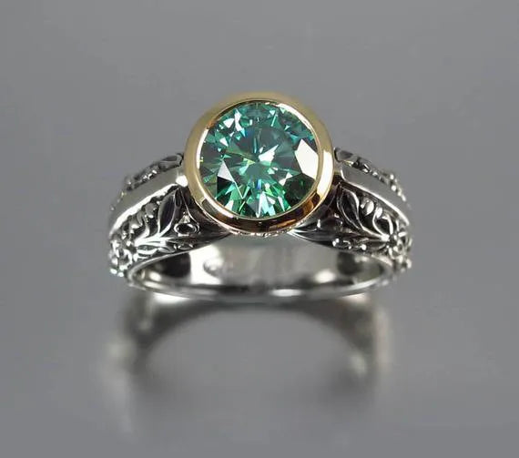 Gold-plated flower-shaped vintage ring with colour separation in green silver on alloy base