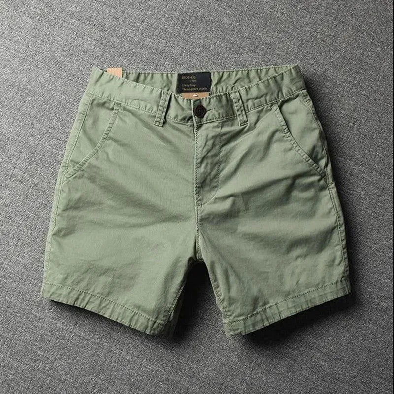 Men's pure cotton loose-fitting straight-leg shorts in a camouflage green colour.