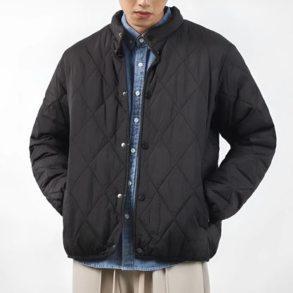 Men's black diamond lattice quilted winter jacket with a long 100cm length and loose fit.