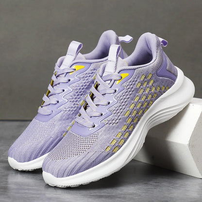 Lavender purple women's Flyknit running shoes with mesh upper and round toe.