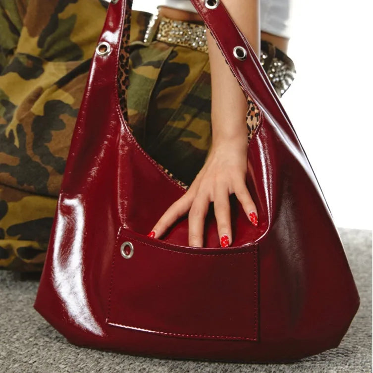 Red leopard print PU leather women's shoulder bag showing dumpling shape and two-side access