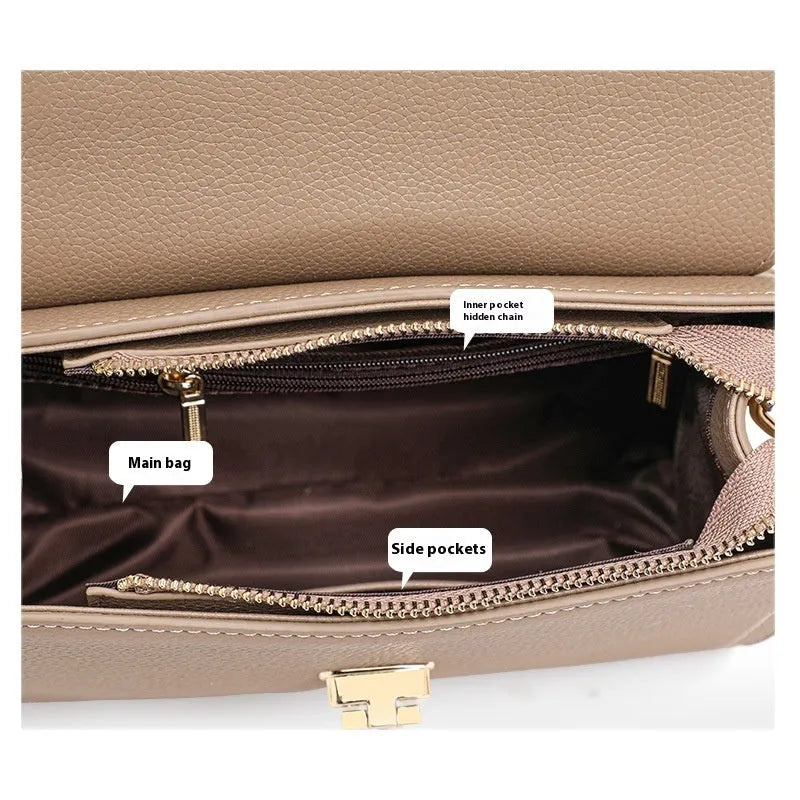 Elephant grey vintage handbag with lock detail and file organisation inside
