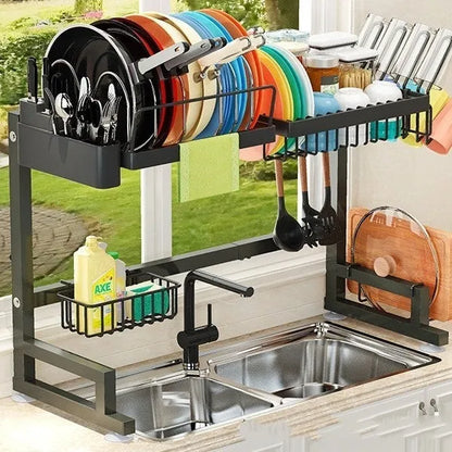 Black metal retractable sink draining rack extended on kitchen countertop