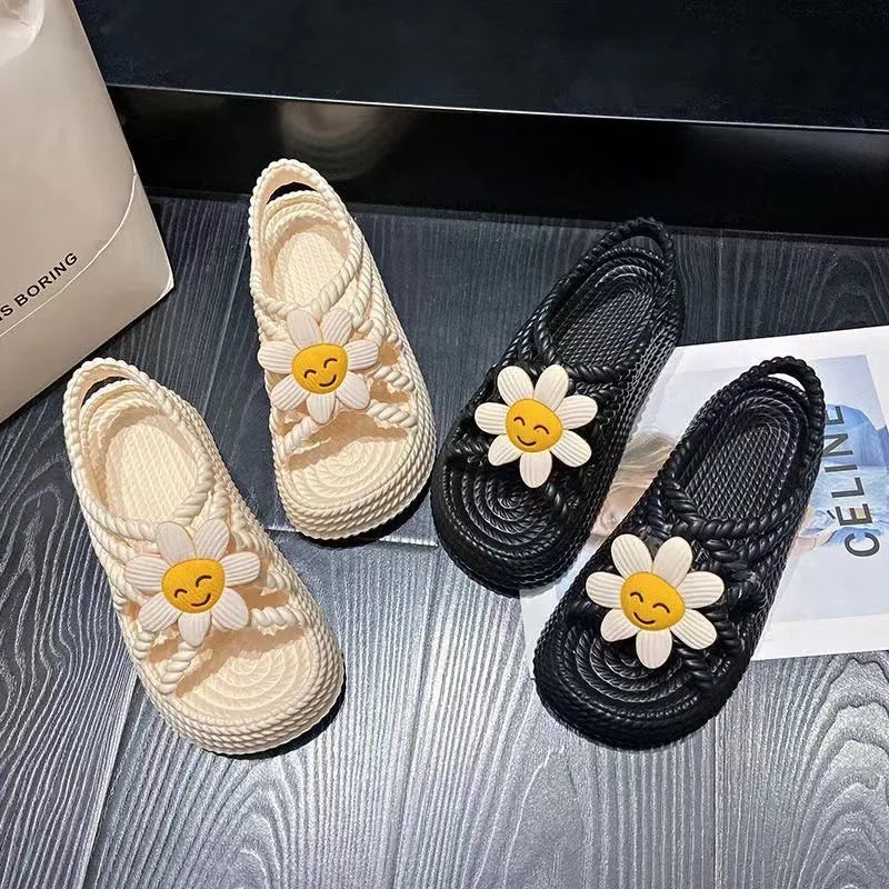 PVC non-slip sandals with round toe and floral decoration in beige colour