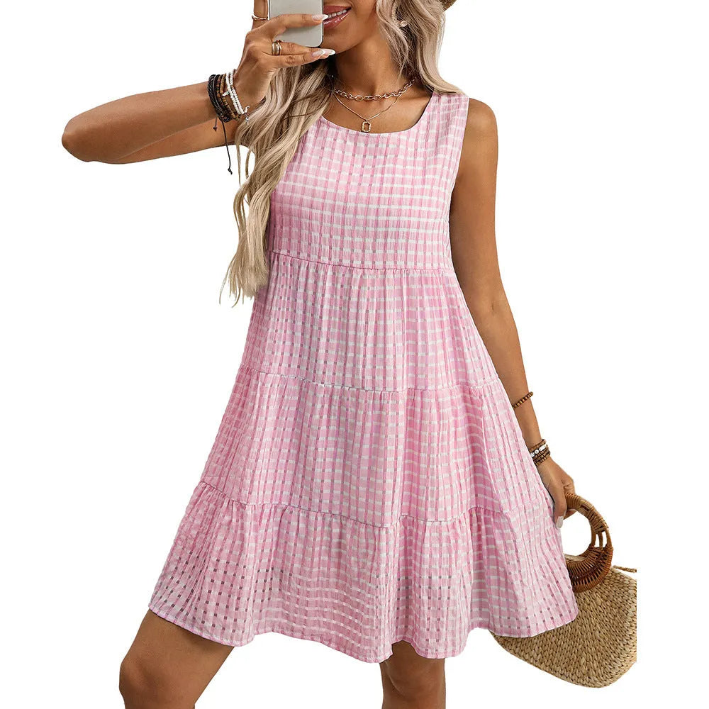Women's sleeveless plaid dress with an oversized swing skirt in light blue.