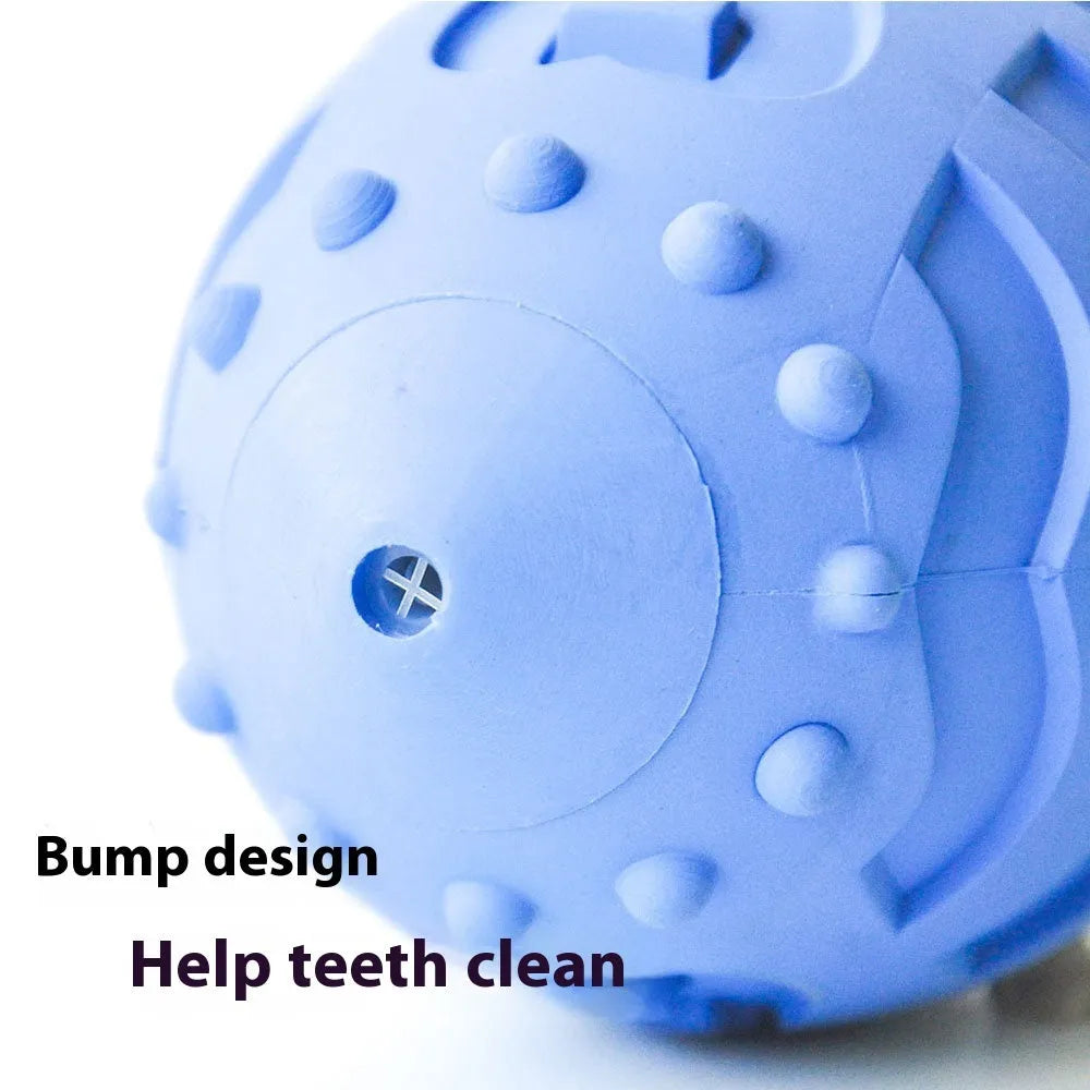 A light green thickened rubber rugby ball dog chew toy on a plain background.