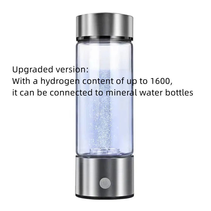 Portable hydrogen water bottle with glass chamber and stainless steel components showing electrolysis bubbles