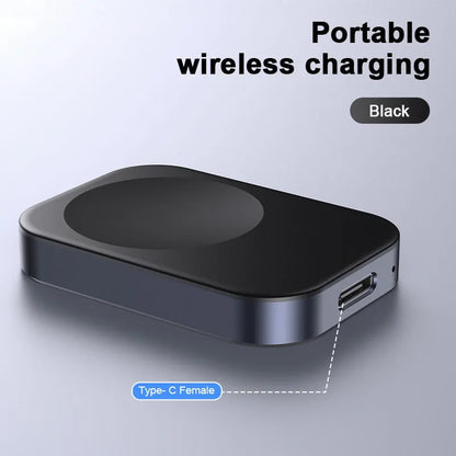 Compact black and white 3-in-1 magnetic wireless charger with integrated cables, shown next to a smartphone for scale.