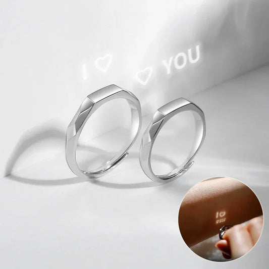 Elegant S925 sterling silver rings with a hidden love pattern design, adjustable sizing for a personalized fit.