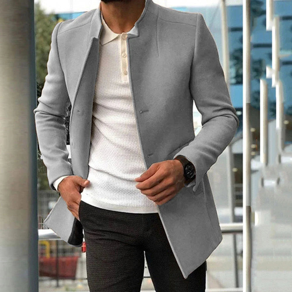 A single-breasted wool-blend coat in various colours, showcasing a tailored silhouette and premium British craftsmanship.